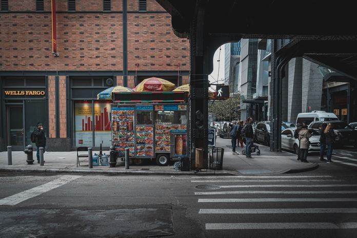 Photo by Joël de Vriend multicolored food cart on road during daytime