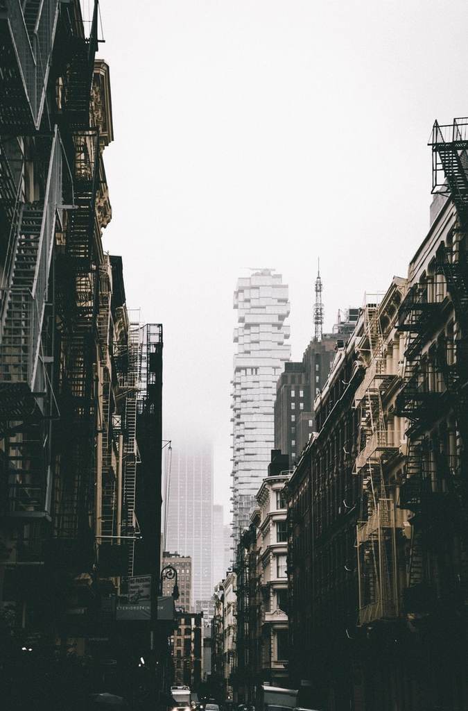 low-angle photography grey and black high-rise buildings