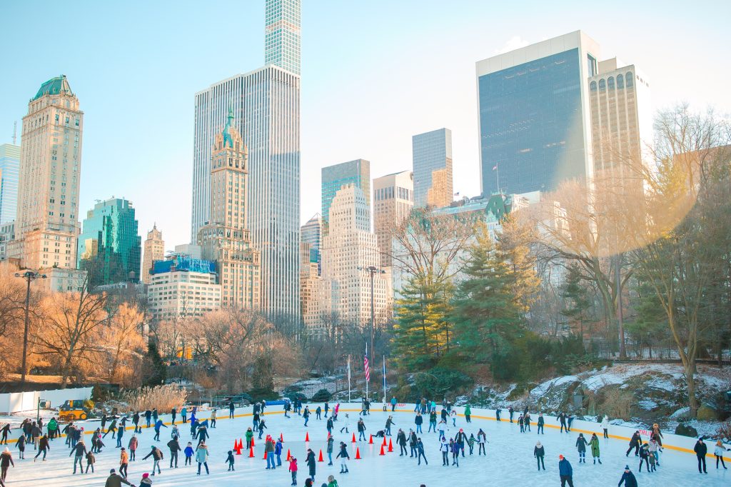 Things to do in New York in January to decompress from the festive December 3 Ice skaters having fun in New York Central Park in winter