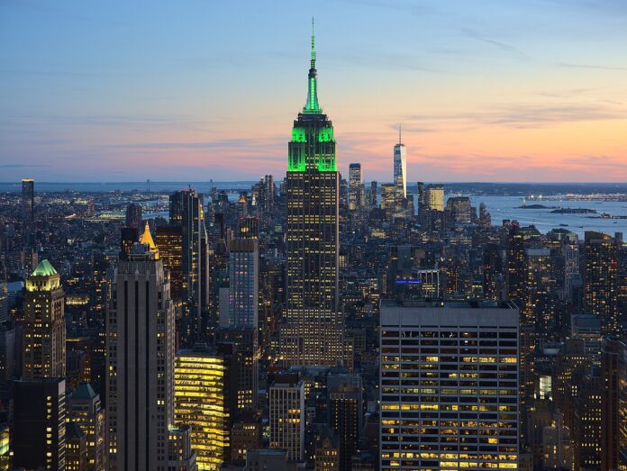 Empire State Building and Lower Manhattan skyline at sunset, viewed from Rockefeller Center